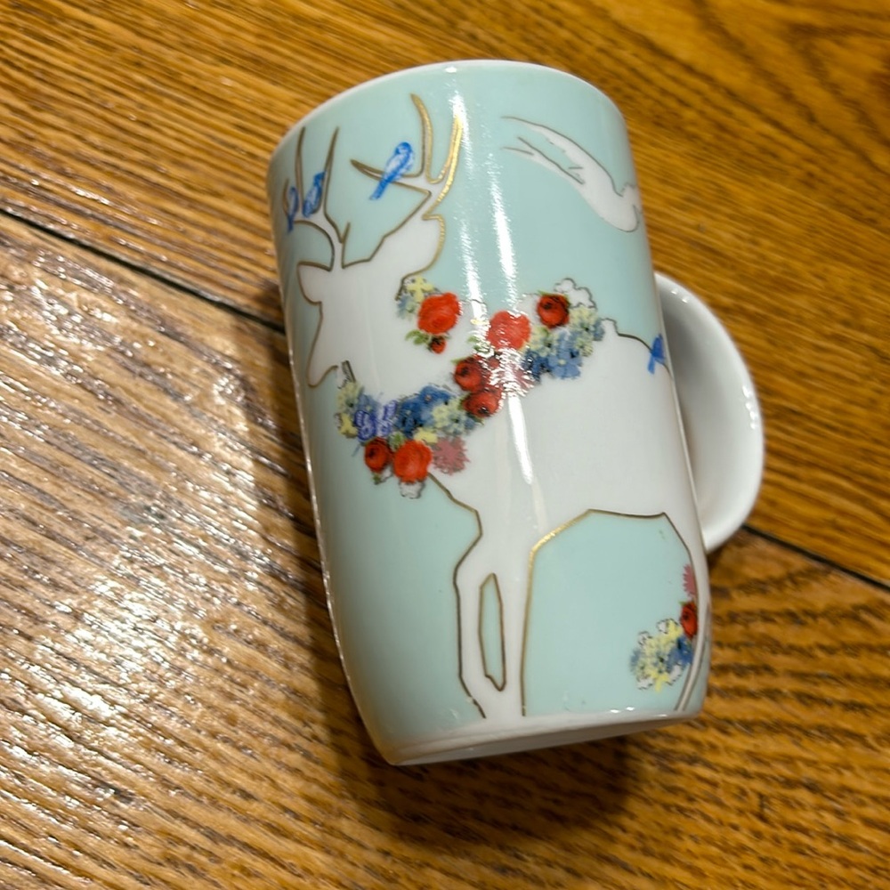 Rosanna “A Walk In The Woods” mug. Deer, flowers, butterflies and blue birds